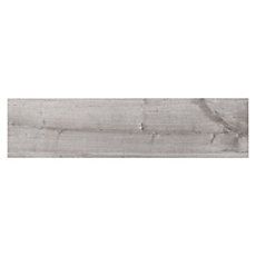 a white wall with wood planks on the bottom and bottom part, in grey tones