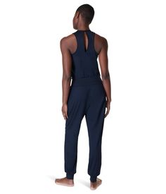 Sleek and stylish, the Sweaty Betty® Gaia Performance Yoga Jumpsuit is perfect to complement your personality. The pull-on style jumpsuit is ideal for low-impact workouts. It features a loose-fit silhouette with a V-neckline, fitted waistband, and cuffed ankles that stay put as you move. The quick-drying properties make this jumpsuit ideal for light workouts and yoga sessions..Sleeveless construction..Button closure at the back..85% polyamide, 15% elastane..Machine washable..Imported. Light Workouts, Yoga Jumpsuit, Style Jumpsuit, Skirt Jumpsuit, Low Impact Workout, Yoga Session, Sweaty Betty, Dress Skirt, Loose Fitting