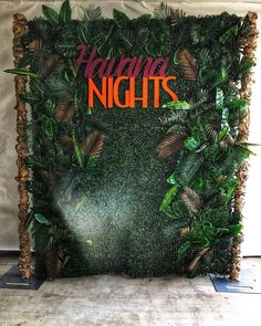 an image of a green wall with plants on it and the words having nights written in red