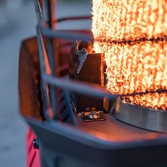 a close up view of the inside of a machine with some metal bars on it