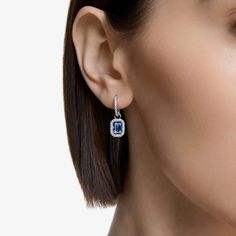 Encircled by graceful white pavé crystals, this pair showcases a central blue dancing cubic zirconia, complemented by a rhodium-plated setting, finished off with a subtle post-fastening. Length: 2.3cm Width: 0.8cm Weight: (Individual Piece): 1.5g Item Code: 5619500 Swarovski Millenia, Pink Watch, Crystal Drop Earrings, Swarovski Jewelry, Large Crystals, Single Earring, Blue Gemstones, Metal Bracelets, Blue Crystals