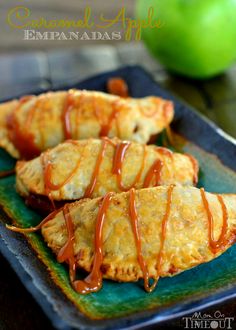 caramel apple empanadas on a green plate