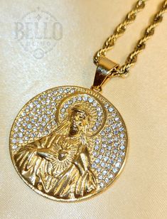 Stainless Steel Necklace: Celebrate your faith with this exquisite Gold Jesus Pendant Necklace. Featuring a beautifully detailed depiction of Jesus Christ surrounded by sparkling crystals, this necklace is a powerful symbol of devotion and grace. Made from high-quality stainless steel with a gold finish, it combines elegance and durability. Pendant Material: High-quality stainless steel with gold finish and crystal accents Chain Material: Stainless steel chain with gold finish Style: Religious, Gold Spiritual Jewelry And Charms For Wedding, Spiritual Pendant Jewelry With Rope Chain, Gold Virgin Mary Medallion Jewelry, Spiritual Virgin Mary Medallion Jewelry, Spiritual Rope Chain Necklace, Christian Fashion, Jesus Christus, Religious Jewelry, Sparkling Crystal