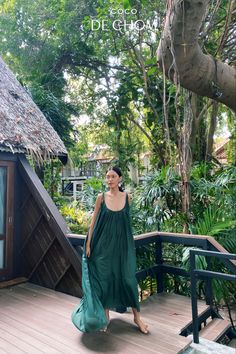 Resort vibes with our Mali Openback maxi dress. Feel comfy while you escape to a tropical island paradise. 🌴☀️ #BeachVacation #HolidayStyle  #resortstyle #beachvibes #resortwear #maxidressesgorgeous #oversizedoutfit #handmade #sustainablefashion Green Tiered Ruffle Dress For Beach, Beach Midi Dress With Ruffled Straps, Summer Beach Tiered Dress With Adjustable Straps, Green Ruffled Straps Vacation Dress, Green Vacation Dress With Ruffled Straps, Summer Green Midi Dress With Adjustable Straps, Vacation Sundress With Tiered Design, Chic Slip Dress With Tie Straps For Vacation, Breezy Sleeveless Maxi Dress With Ruffle Hem