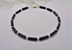 14k White Gold Anklet 14k Black Onyx Anklet 14kt Gold Ankle Bracelet 14k Gold Black Anklet Black Onyx Ankle Bracelet  This anklet is made with Genuine Black Onyx nestled between Solid 14kt Gold beads. All metal is 100% Genuine 14kt Gold. Stamped 14k. Please select length and charm from the drop down menu.  * When you purchase any 3 items you will receive one  additional item of your choice for free. A Free item is earned with every 3 purchases.  * Do not purchase the free item.  Simply send a message along with payment describing which item you would like. Free item must be of equal or lesser value. Thanks for looking at my jewelry! Black Anklet, Ankle Bracelets Gold, Gold Body Jewellery, Crystal Anklet, Heart Anklet, Ankle Jewelry, Beach Anklets, Gold Anklet, Ankle Bracelet