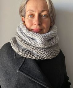 Gray Knitted Snood Wool Imagine a stylish and elegant accessory that will become your faithful companion during the cold season. This is a snood--an amazing embodiment of warmth and comfort. It's crafted from the softest yarn, gently enveloping your skin and wrapping you in softness and coziness. This snood comes in beautiful shades, ranging from warm earthy tones to delicate pastels, creating a sense of harmony and tranquility. The uniqueness of this snood lies in its versatility. Thanks to its special design, it can be worn not only as a classic scarf but also transformed into an elegant headpiece. Simply wrap it around your neck and pull it over your head, and you're ready to conquer the winter streets in an "ice queen" style. This accessory is perfect for those who value style and comf Gray Chunky Knit Knitting Pattern, One Size Wool Knitting Pattern For Winter, Cozy Gray Knitting Pattern, Merino Wool Knitting Pattern For Winter, Winter Merino Wool Knitting Pattern, Winter Knitting Pattern In Gray, Cozy Gray Knitted Knitting Pattern, Cozy Gray Winter Knitting Pattern, Cozy Acrylic Yarn Knitting Pattern