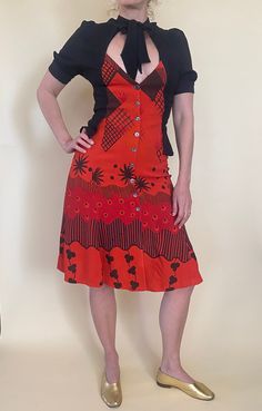 "Ossie Clark Dress in Red and Black Celia Birtwell Print. Made of Crepe Moss Peplum at Waist, Buttons at Front, and Tie Front.  Has has Fabric Added to Underarm in Black Satin to Add Width ti Bust/Shoulder.  Missing Label *Shorts in images are NOT INCLUDED, they are Sold Separately in my Listings. Measurements:  Bust: 33\" Waist 27\" Hips 39\" Length 52\" Condition: Good Has Some Fading of the Black Fabric at Sleeves, Fabric added to Underams and Sleeves for Width, MisMatched Buttons, and a Few Retro Fitted Midi Dress With V-neck, Retro Red Knee-length Midi Dress, Red Retro Knee-length Midi Dress, Retro Red Short Sleeve Dress, Retro Fitted Rayon Dresses, Fitted Red Rayon Dress, Fitted Retro Print Short Sleeve Dress, Fitted Dress With Retro Print And Short Sleeves, Red Retro Print Dress For Spring