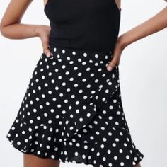 Brand: Zara New With Tags Size L Color: Black & White Side Hidden Zip Made In Cambodia 100% Viscose Smoke Free/Pet Friendly Home. Estimated Measurements: Waist 30in Rise 15in Inseam 2in Leg Width 11in Elegant Polka Dot Skirt For Summer, Elegant Polka Dot Summer Skirt, Summer Polka Dot Mini Bottoms, Polka Dot Mini Bottoms For Spring, Polka Dot Mini Length Bottoms For Spring, Polka Dot Skirt For Party, Spring Polka Dot Mini Bottoms, Polka Dot Party Skirt With Ruffles, Polka Dot Party Skirt