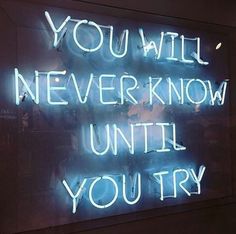 a neon sign that says you will never know until you try