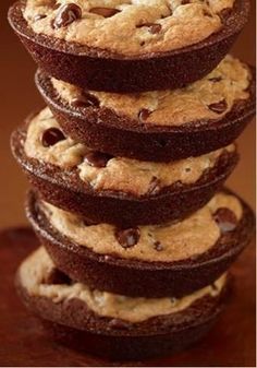 a stack of cookies sitting on top of each other next to a postcard with the caption write a comment