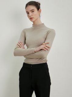 Editor's Notes This basic half turtleneck knit top with stretch has comfortable fit and slim silhouette. It is perfect top for daily look and layering item.- Soft texture- Slim silhouette- Stretch fabric- Half turtleneckMeasurements(in.)One size- Shoulder: 11.81 in. - Chest: 13.78 in.- Sleeve Length: 22.44 in. - Total Length: 22.44 in.* Model info: Height 5' 8.5Composition & Care- 65% Polyester, 30% Rayon, 5% Spandex- Dry cleaningDesigner- by NICK&NICOLE Trendy Beige High Neck Turtleneck, Elegant Turtleneck Top For Business Casual, Elegant Business Casual Turtleneck Top, Elegant High Stretch Mock Neck Top, Chic Solid Turtleneck For Workwear, Fitted Turtleneck Top For Business Casual, Chic Solid Color Turtleneck For Work, Versatile Solid Turtleneck For Work, Elegant High Stretch Turtleneck For Work