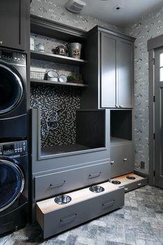 a washer and dryer in a small room