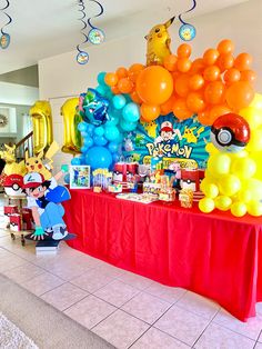 a pokemon themed birthday party with balloons and decorations