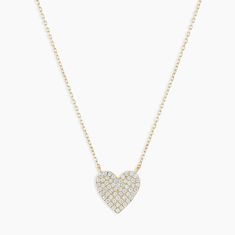 An array of dazzling pavé diamonds illuminates this 14k gold heart necklace. This is the perfect gift for Mom or for a loved one. Product Details 0.358 total carat weight Fifty-four 0.9mm and four 1 mm round GH SI1-SI3 diamonds 14k solid gold 15" chain + 2" extender. Adjustable in 1" increments 15" - 17" Pavé heart measures 10 mm by 10 mm Spring ring closure | Diamond Pavé Heart Necklace in Gold, Women's in 14k gold by Gorjana Elegant Diamond White Heart Charm Necklace, Formal Diamond Heart Necklace With Heart Charm, Formal Diamond Heart Necklace With Charm, Formal Diamond Heart Charm Necklace, Luxury Heart Cut Necklace With Pave Setting, Luxury Heart-shaped Brilliant Cut Diamond Necklace, Luxury Heart Cut Necklaces With Pave Setting, Formal Diamond Heart Necklace, Formal Heart-shaped Diamond Necklace