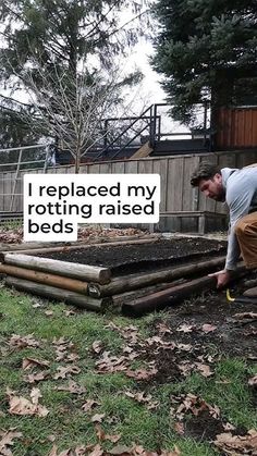 a man is bending over to pick up some plants in the yard with words written on it