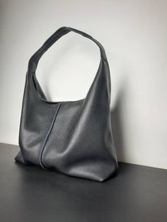 Black Slouchy Bag, Minimalist Hobo Tote Bag For On-the-go, Minimalist Tote Hobo Bag For On-the-go, Versatile Black Textured Leather Hobo Bag, Versatile Textured Leather Tote Shoulder Bag, Versatile Hobo Bag With Textured Leather And Double Handle, Faux Leather Hobo Tote Bag, Everyday Faux Leather Hobo Tote Bag, On-the-go Soft Faux Leather Hobo Bag