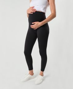 It's mind-boggling how much of the plastic waste in our oceans comes from discarded clothes! It's also mind-boggling to imagine a woman getting through pregnancy without an amazing pair of leggings! Now you can handle both problems with our silky soft, Wear Everywhere maternity leggings. Made from recycled nylon and spandex, these leggings pair perfectly with casual streetwear, and are breathable enough to be your best yoga buddy. Best of all, they have a generous-sized pocket in the back of the Pregnancy Leggings, Maternity Wardrobe, Pregnancy Yoga, Sustainable Fabric, Maternity Leggings, Plastic Waste, Best Yoga, Casual Streetwear, Yoga Class