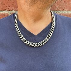 "If you want a quality chain with solid construction, look no further.  This is a 14mm wide, Matte Stainless Steel Cuban Link Curb Chain with a secure and easy to use lobster clasp closure.  This is the widest of my curb chains. I have a picture listed for you to compare the different widths. Stainless Steel is very durable and does not tarnish. You will love the look and feel of this chain. A matching bracelet is shown in one of the pictures but listed separately.  The Cuban Link Chain Collection has matching bracelets and gold and black stainless finishes as well. Be sure to check out the complete line here: https://etsy.me/31wBRXB S I Z E Width: 14mm  Length: 18\", 20\", 22\" and 24\" please choose from menu  Thickness: 7mm 316L Matte Stainless Steel All chains are custom made and retur Silver Cuban Link Necklace, Everyday Silver Cuban Link Necklace, Cuban Link Necklace, Miami Cuban Link Chain, Miami Cuban Link, Miami Cuban, Matching Bracelet, Cuban Link Chain, Cuban Chain