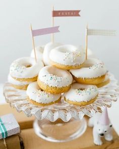 there are many donuts on the cake plate