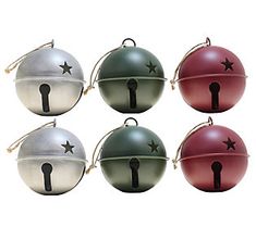 six christmas baubles with star designs on them