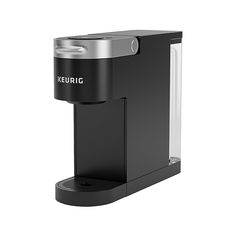 the keurig espresso machine is black and silver