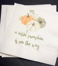 two white napkins with pumpkins on them and the words, a taste pumpkin is on the way