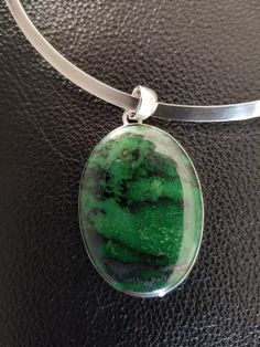 "Large Transvaal Jade stone set in sterling silver pendant. The stone is a dark green with darker stratification. The pendant is 1.5 inches long without the bail; with bail, it measures 1.8 inches. The pendant comes with a sterling silver stiff collar necklace. The necklace is 5.5 inches long and 4.5 inches wide. it has 2.6 inch gap so it can be easily put on or taken off. The collar has a maker's mark and is marked \"925\" and \"Mexico\". The collar can be worn with or without the pendant." Vintage Sterling Silver Rings, Silver Flats, Amber Bracelet, Diamond Ring Settings, Choker Collar, Jade Stone, Maker's Mark, Collar Necklace, Stone Settings