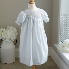 This Classic Strasburg Pale Robin's Egg Blue Bishop/Float Style Dress Is Beautifully Detailed With Hand Embroidery In White, Pink And Green And Blue. Made Of 100% Cotton Lawn. Hand-Smocked At The Neckline And Gathered Sleeves. Size 3 But Will Accommodate Size 4 As Well Due To Strasburg's Generous Sizing. Length Is 25 Inches. Perfect For Spring Or Summer Vacations, Church, Portraits Or Any Special Occasion . Matching Sister/Cousin Sleeveless Dresses Available In Sizes 2t (2 Available), Size 6 And A Coordinating Pale Pink/Coral Dress In Size 4 (See Last Two Images). Limited Edition Color- Difficult Find!! Excellent Condition! Like New, Perfect Condition!!! Matching Sisters, Robin's Egg Blue, Summer Vacations, Hand Smock, Sleeveless Dresses, Gathered Sleeves, Coral Dress, Robins Egg Blue, Pink Coral