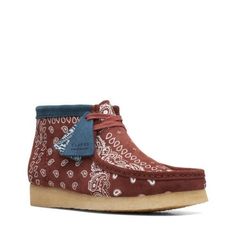 Discover the perfect blend of style and comfort with the Clarks Originals Wallabee Boot Bandana in Red Paisley Suede (26168826). Designed with utmost precision, these boots offer a contemporary twist to the classic Clarks design. Featuring an eye-catching bandana print in a vibrant red paisley hue, these boots guarantee to make a bold statement and add a splash of color to your ensemble. Known for its durability, the soft suede material offers a comfortable fit, ensuring these boots are not just Clarks Shoes Mens, Mens Clarks, Clarks Wallabee, Paisley Color, Clarks Wallabees, Red Paisley, Latest Shoe Trends, Clarks Originals, Bandana Print