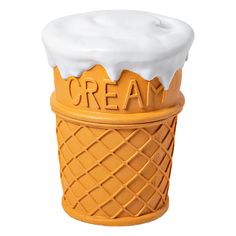 an ice cream container with white icing on it's top and the word cream written in large letters