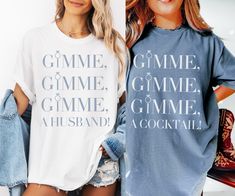 two women standing next to each other wearing t - shirts that say, gimme, gimme, and husband