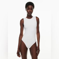 Aritzia Babaton Contour Bodysuit. Tags Attached. Never Worn. Size Medium White Tight-fitting Swimwear For Summer, White Second-skin Swimwear For Summer, White Sleeveless Fitted Leotard, White Fitted Sleeveless Bodysuit, White Fitted Sleeveless Leotard, Fitted Sleeveless Beachwear Bodysuit, White Second-skin One-piece Bodysuit, Second-skin Sleeveless Beachwear Bodysuit, Sleeveless Second-skin Bodysuit Beachwear