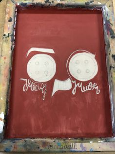 a painting with words written on it in front of a red background that says happy new year