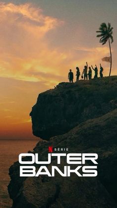 the movie poster for outer banks with people standing on top of a cliff overlooking the ocean