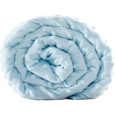 a blue blanket on top of a white surface with a circular hole in the middle