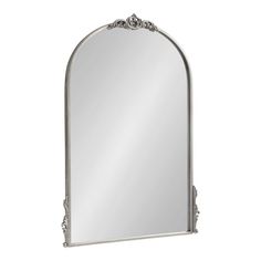 a large silver mirror with an ornate frame on the top and bottom half of it