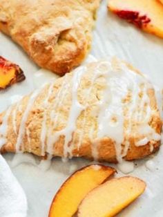 peach scones with icing and sliced peaches