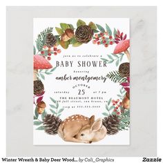 the woodland baby shower is decorated with pine cones, berries and deer's head