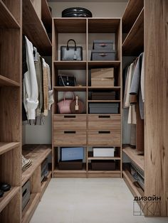 a walk in closet with wooden shelves and drawers