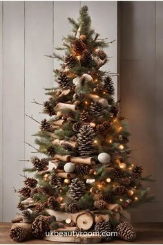 a christmas tree decorated with pine cones and lights