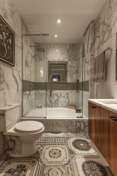 a bathroom with a toilet, sink and bathtub