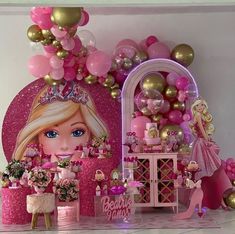 a barbie birthday party with pink and gold decorations