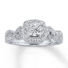 a diamond ring with an intricate design on it