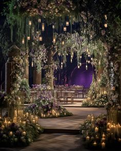 an outdoor wedding setup with candles and flowers