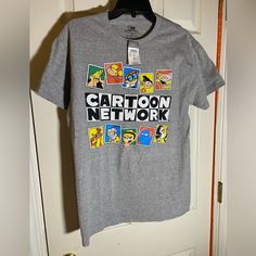 Cartoon Network T-Shirt Sz M Gray Rue21 Nwt Original Price $22.99 Brand New With Tags. Only Usa Shipping. No International Shipping. Will Ship With In 3 Business Days After Payment Has Been Made. I Do Combine Shipping. I Do Use Recycled Shipping Items To Stay Eco Friendly For Our Beautiful Earth. Please Leave Positive Feedback, And I Will Return Positive Feedback For Better Customer Satisfaction, Thanks. Gray Logo Print Top For Fan Merchandise, Pre-shrunk Graphic Tee For Fan Merchandise, Pop Culture Tops With Letter Print, Gray Short Sleeve Fan Apparel Top, Pop Culture Crew Neck Top With Logo Print, Pop Culture Logo Print Crew Neck Tops, Gray Graphic Tee With Character Print, Gray Graphic Print Fan Apparel Top, Gray Cotton Tops With Character Print