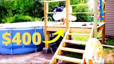 an above ground swimming pool with stairs to the side and a sign that says $ 400