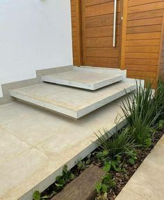 two concrete steps sitting next to each other