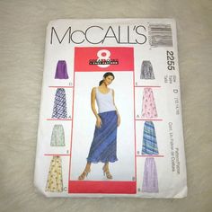 a woman's skirt and top sewing pattern on the cover of a book,