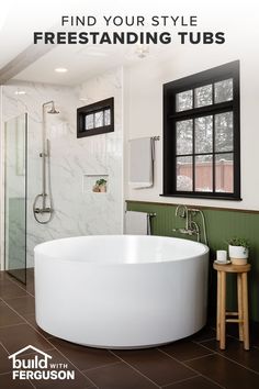 a large white bath tub sitting next to a window