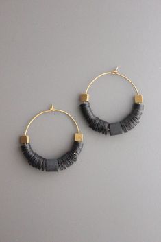 Handmade Black Brass Jewelry, Modern Black Single Earring, Modern Black Hoop Jewelry, Modern Handmade Black Hoop Earrings, Modern Black Handmade Hoop Earrings, Modern Black Jewelry With Ear Wire, Black Minimalist Handmade Hoop Earrings, Modern Black Small Hoop Jewelry, Minimalist Handmade Black Hoop Earrings